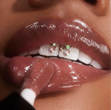 e.l.f model applying lipstick