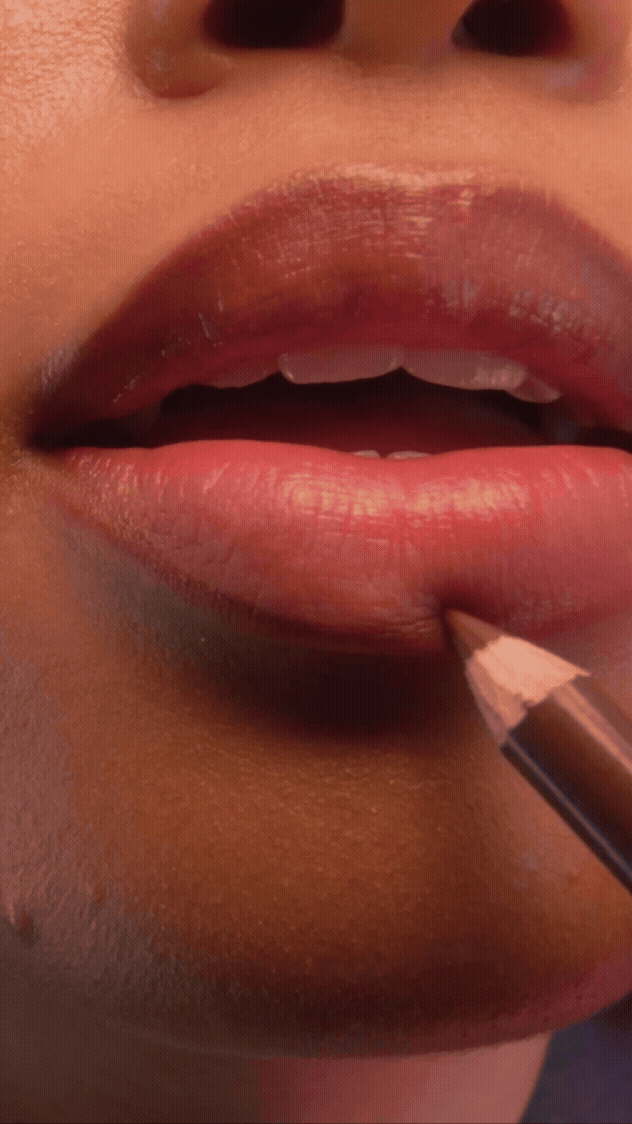 Model applying e.l.f. Lip Liner