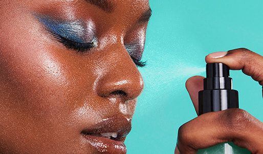 Spraying e.l.f. Power Grip Dewy Setting Spray